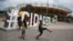 Children play soccer at the Olympic park which was used for the Rio 2016 Olympic Games, in Rio de Janeiro, Brazil, Feb. 5, 2017. 