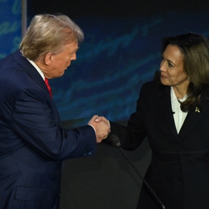 U.S. Vice President and Democratic presidential candidate Kamala Harris and former U.S. President and Republican presidential candidate Donald Trump shake hands at the start of a presidential debate at the National Constitution Center in Philadelphia, Pennsylvania, on September 10, 2024. (AFP) 