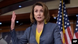 FILE - House Minority Leader Nancy Pelosi of California speaks during a news conference on Capitol Hill in Washington, March 23, 2017. 