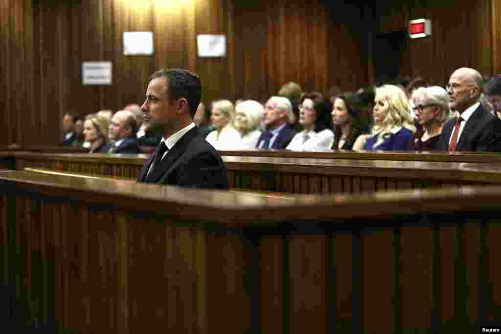 Oscar Pistorius listens to Judge Thokozile Masipa deliver her verdict, Sept. 12, 2014.