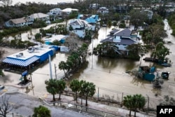 Kawasan Siesta Key, Florida, terendam banjir akibat Badai Milton, 10 Oktober 2024. (Miguel J. Rodriguez Carrillo / AFP)