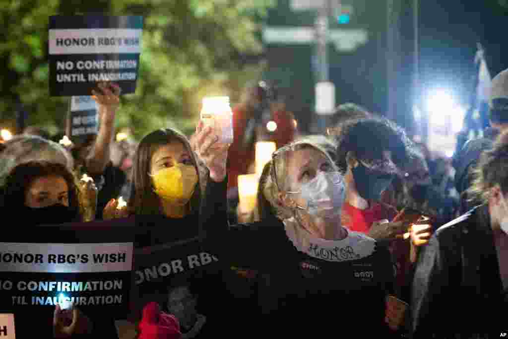 People gather outside the Supreme Court in Washington, D.C., for a vigil to honor the late Justice Ruth Bader Ginsburg, Sept. 19, 2020.