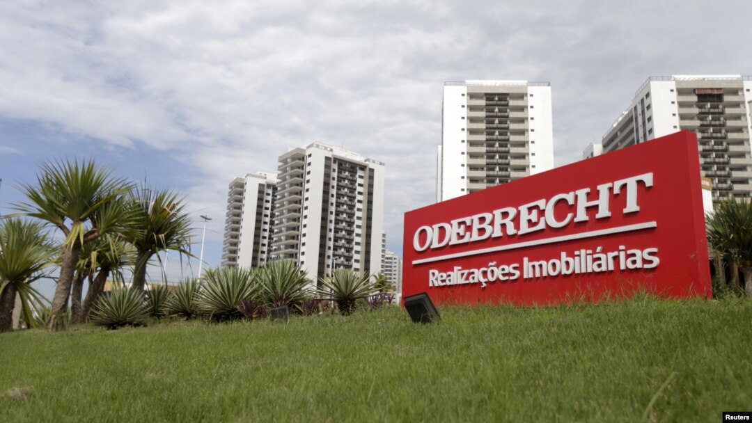 FILE - A sign of the Odebrecht SA construction conglomerate is pictured in Rio de Janeiro, Brazil, Feb. 26, 2016.