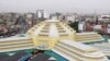 An elegant dome is seen atop French style Centeral Market "Phsar Thom Thmei" as it reopens Wednesday, May 25, 2011, in Phnom Penh, Cambodia, after seven years of renovations. Central Market is a large market constructed in 1937 in the shape of a dome wit