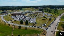 People leave Apalachee High School in Winder, Georgia after a shooting, Sept. 4, 2024.