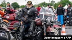 Clarke Lisk, from San Diego, California, a Vietnam Veteran 1969-1970, waits at Robert F. Kennedy Memorial Stadium before participating in the ‘Rolling to Remember’ motorcycle rally as they ride past the Lincoln Memorial on May 30, 2021 in Washington, DC. 