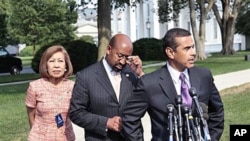 Mayors, from left to right, Elizabeth Kautz, Burnsville, Minnesota, Michael Nutter, Philadelphia, Pennsylvania, and Antonio Villaraigosa, Los Angeles, California, talk to the media following their meeting with President Barack Obama and Vice President Joe