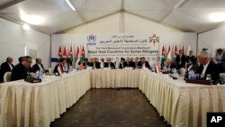 UN High Commissioner for Refugees (UNHCR) Antonio Guterres (C-L) speaks during the third Ministerial Coordination Meeting of Major Host Countries for Syrian Refugees, at Zaatari Refugee Camp in Mafraq, Jordan, May 4, 2014.