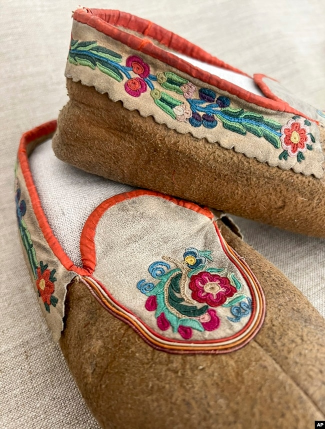 This undated photo provided on Wednesday, July 20, 2022, by Gregory Scofield, shows a pair of shoes he made in the late 19th-century Cree-Metif native Canadian traditional style. The Vatican's Anima Mundi Ethnological Museum houses tens of thousands of artifacts and art made by Indigenous peoples from around the world. (Gregory Scofield via AP)