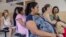 FILE - Women wait for prenatal exams at the National Hospital for Women in San Salvador, El Salvador, Jan. 29, 2016. Many fear infection by the Zika virus, which may be linked to neurological disorders in babies.