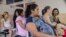 FILE - Women wait their turn for their pre-natal exams at the National Hospital for Women in San Salvador, El Salvador, Jan. 29, 2016.