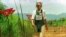 FILE - Diana, Princess of Wales is seen in this Jan. 15 1997 file picture walking in one of the safety corridors of the land mine fields of Huambo, Angola during her visit to help a Red Cross campaign to outlaw landmines worldwide.