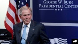 FILE - Former president George W. Bush speaks in Dallas, Texas, April 12, 2011.