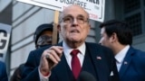 FILE - Rudy Giuliani speaks during a news conference outside federal court in Washington, Dec. 15, 2023.