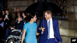 FILE - Prince Harry and Meghan Markle arrive at the annual Endeavour Fund Awards in London, Britain, March 5, 2020.