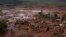 Aerial view of the debris after a dam burst at the small town of Bento Rodrigues in Minas Gerais state, Brazil, Nov. 6, 2015. 