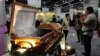 At Hong Kong Trade Fair, Funerals Go Green, High Tech