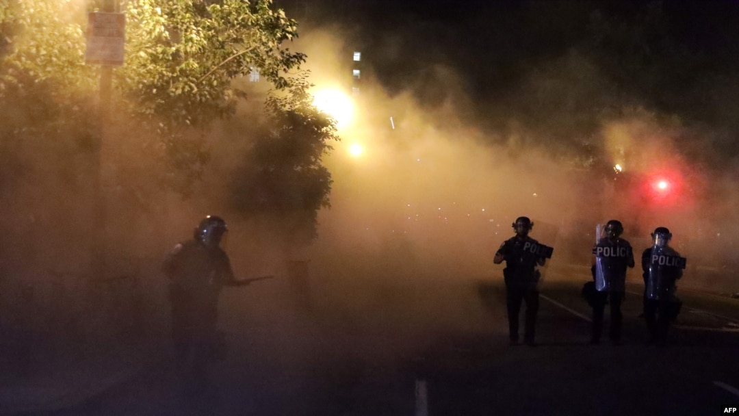 Police hold a perimeter near the White House as demonstrators gather in the morning hours on May 31, 2020 in Washington, DC. 