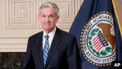 Jerome Powell arrives to take the oath of office as Federal Reserve Board chair at the Federal Reserve, Feb. 5, 2018, in Washington. 