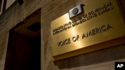 FILE - This June 15, 2020, file photo shows the Voice of America building in Washington. VOA's acting director has denounced Iran for convicting a number of VOA Persian journalists in absentia. 