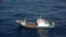 FILE - A Chinese fishing boat is shown Dec. 29, 2012. The Argentine coast guard sunk a Chinese trawler illegally fishing in its territorial waters, according to reports Tuesday.