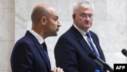 French Minister for Europe and Foreign Affairs Jean-Noel Barrot, left, and Ukrainian Foreign Minister Andrii Sybiha speak during a joint press conference in Kyiv on Oct. 19, 2024.