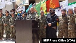 Para pejuang Pasukan Demokrat Suriah (SDF) di Raqqa (foto: dok).