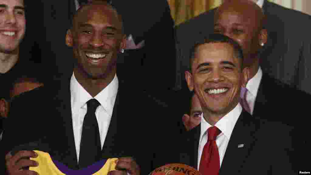 President Barack Obama shares a laugh with Kobe Bryant 