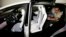FILE - The Tesla Model X car, with a third row of seats, is introduced at the company's headquarters, Sept. 29, 2015, in Fremont, Calif. 