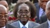 Umongameli Robert Mugabe esanda kwethekelela iSouth Africa. (AP Photo)