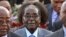 Umongameli Robert Mugabe esanda kwethekelela iSouth Africa. (AP Photo)