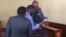 Job Sikhala and his lawyers in court ...