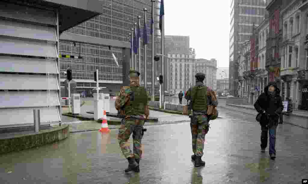 In the midst of heightened security, soldiers patrol the EU headquarters in Brussels, Belgium, Jan. 19, 2015.