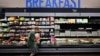 FILE - A shopper picks up bacon on August 14, 2024 in Rosemead, California. The U.S. economy is set to report another quarter of solid growth Wednesday, less than a week before the election, but analysts say it remains unclear if positive data can sway inflation-weary voters. 