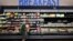 FILE - A shopper picks up bacon on August 14, 2024 in Rosemead, California. The U.S. economy is set to report another quarter of solid growth Wednesday, less than a week before the election, but analysts say it remains unclear if positive data can sway inflation-weary voters. 