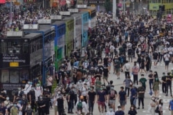 Pro-democracy protesters march during a protest against Beijing's national security legislation in Hong Kong, May 24, 2020.