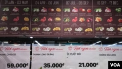 Various types of fruit are on display at a Vietnamese supermarket. Many consumers are switching to ready-to-eat, processed foods instead of relying on their traditional, plant-heavy diets. (H. Nguyen/VOA) 