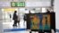 A thermal camera monitor shows the body temperature of people at the Seoul Railway Station in Seoul, South Korea, March 2, 2020. 