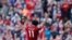 Mohammed Salah salue les supporters lors du match contre Brighton, Angleterre, le 13 mai 2018.