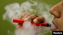 FILE - A U.S. government study has found that vaping rates among young students fell sharply in 2020.