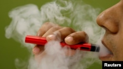 FILE - So far, investigators have not identified a particular device, liquid or ingredient behind the U.S. outbreak of severe vaping-related illnesses. 