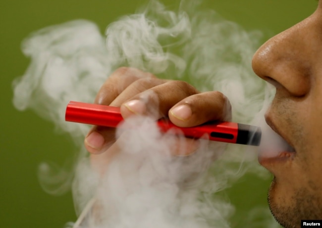 FILE - So far, investigators have not identified a particular device, liquid or ingredient behind the U.S. outbreak of severe vaping-related illnesses.