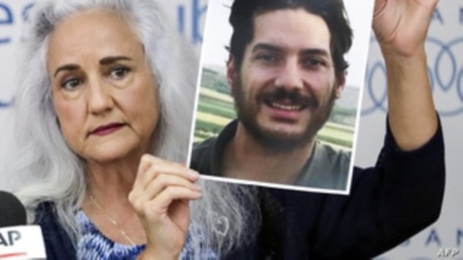 FILE - Debra Tice, mother of U.S. journalist Austin Tice who was kidnapped in Syria in 2012, holds a dated portrait of him during a press conference in the Lebanese capital Beirut on July 20, 2017. 