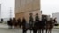 FILE - U.S. Border Patrol officers on horseback watch President Donald Trump (not pictured) review border wall prototypes in San Diego, March 13, 2018.