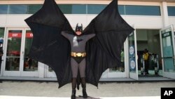 FILE - Howard Gemsler of Irvine dresses as Batman at Comic-Con, in Sand Diego, July 20, 2017.