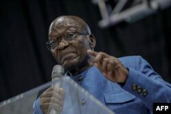 FILE —Former South African President Jacob Zuma speaks during the Shekainah Healing Ministries Prophetic Pillowcase service in Phillipi, near Cape Town, on March 10, 2024 ahead of the South African presidential elections scheduled for May 29, 2024.