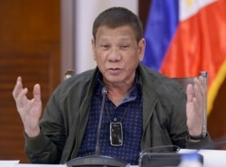 Philippine President Rodrigo Duterte discusses issues related to the new coronavirus, in Panacan, Davao City, southern Philippines, July 7, 2020, in this photo provided by the Malacanang Presidential Photographers Division..