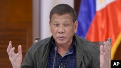 FILE - Philippine President Rodrigo Duterte discusses issues related to the new coronavirus, in Panacan, Davao City, southern Philippines, July 7, 2020