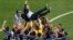 French players throw their head coach Didier Deschamps into the air to celebrate at the end of the final match between France and Croatia at the 2018 soccer World Cup in the Luzhniki Stadium in Moscow, Russia. France won its second World Cup title by beating Croatia 4-2.
