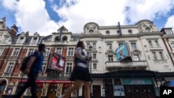 Theaters in the West End are closed due to the coronavirus outbreak, in London, Aug. 1, 2020.